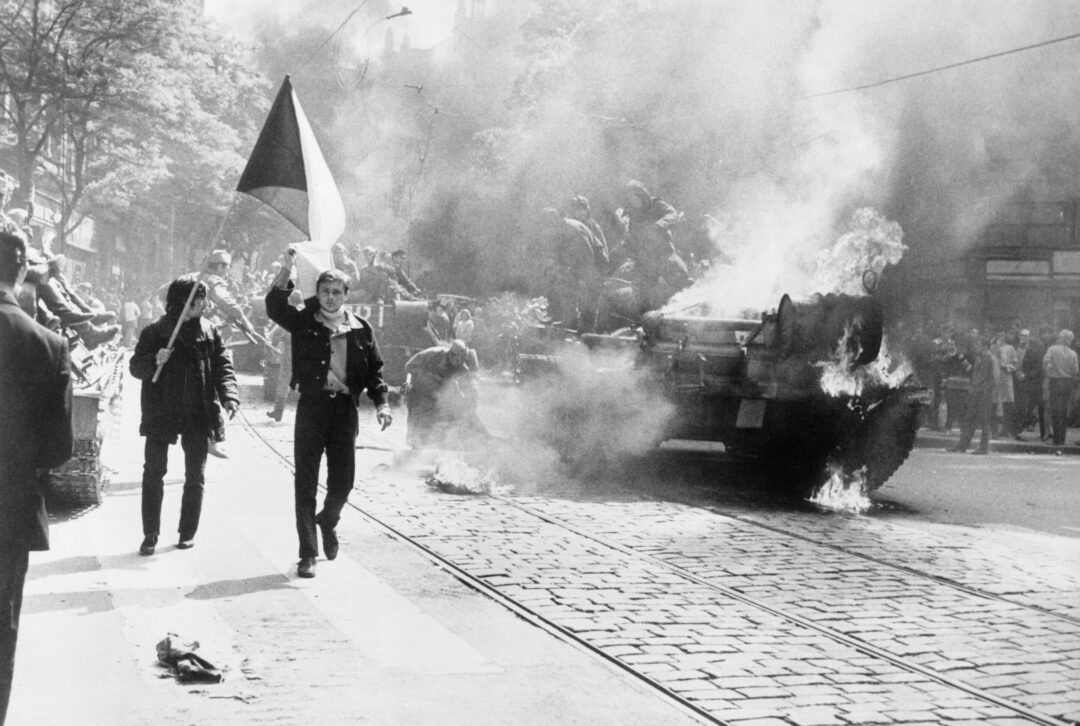 A tank on fire in the city